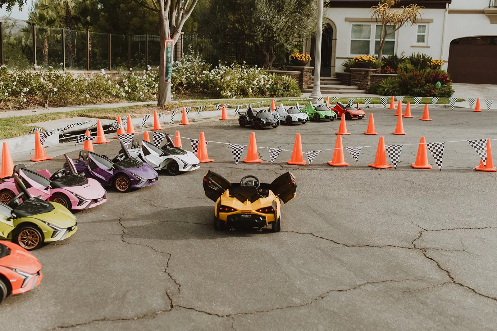 A Little Racers OC branded Lamborghini racetrack setup ready for a Stanton birthday party